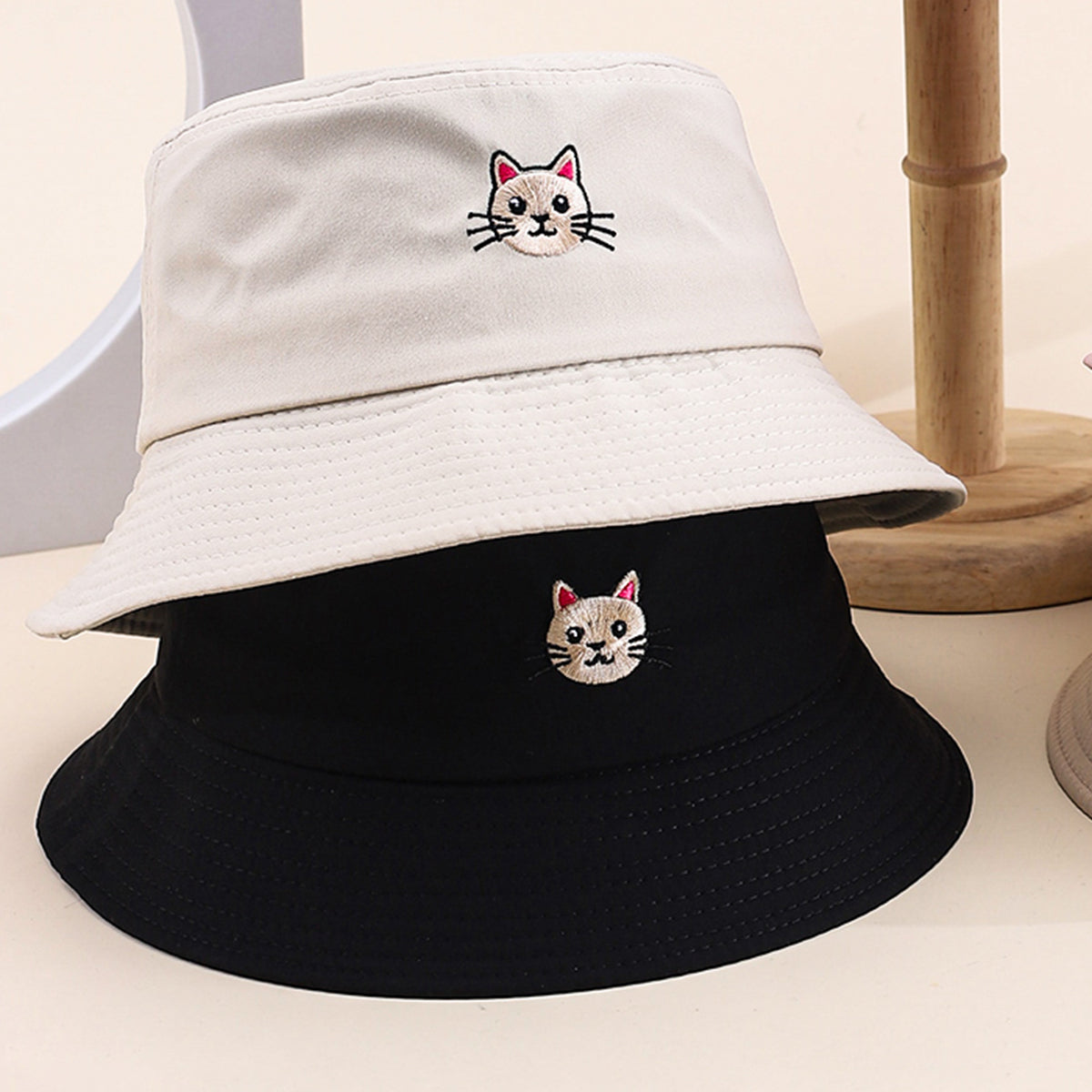 Women's cat bucket hat color options display