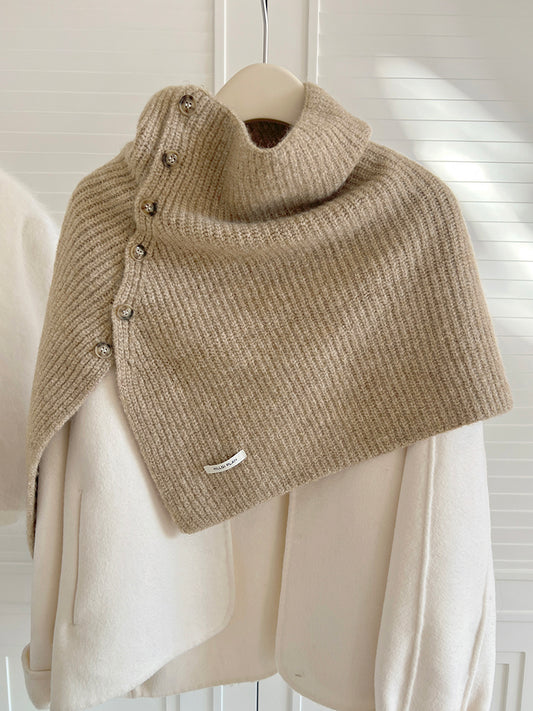 Women's High Neck Buttoned Knit Cape Shawl — khaki buttoned shawl draped over a cream top