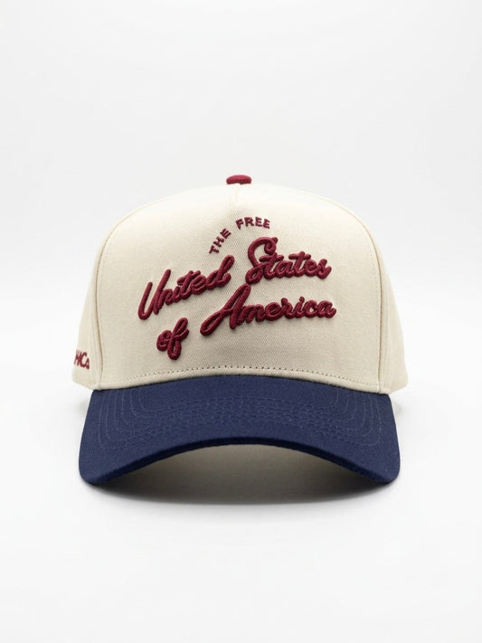 Front view of the Destination Hat Co. U.S.A. script cap with red embroidery