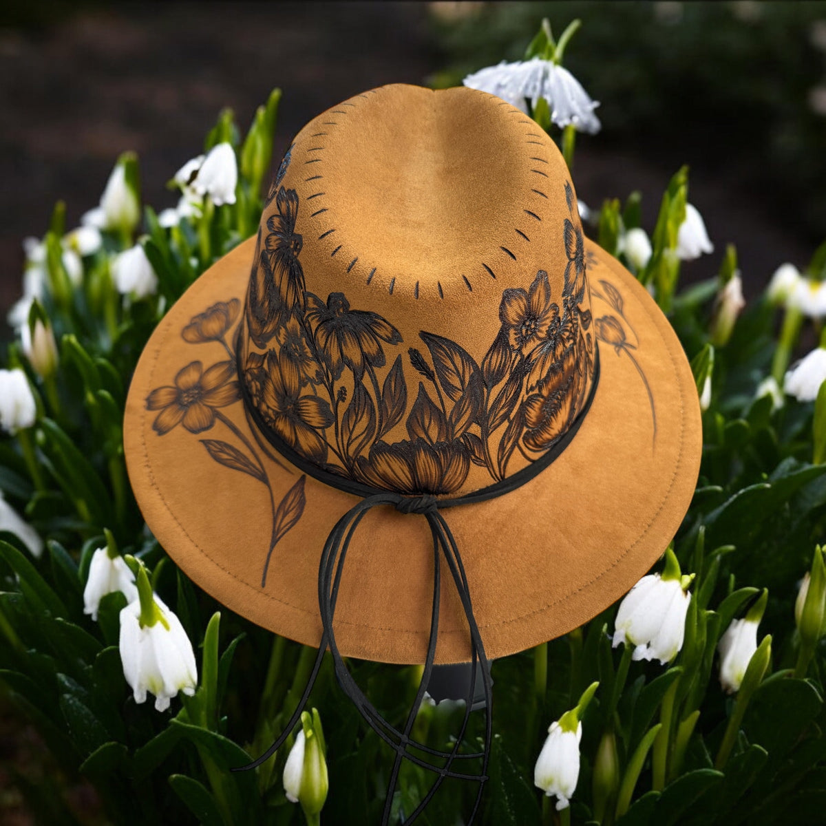 Overhead view of the Flower Garden hat showing the decorated small brim