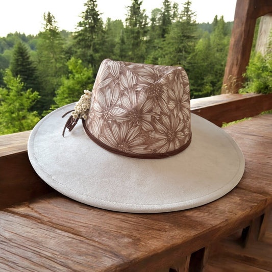 Side view of the Playful Daisies hat showing crown artwork and decorative trim