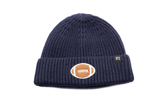 Rey To Z midnight ribbed beanie showing its football cuff patch