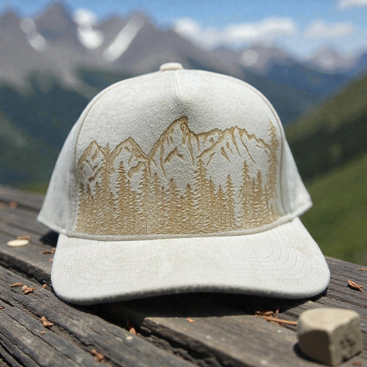 Grand Tetons suede cap photographed with mountains in the background
