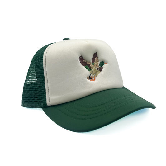 Angled view of Rey To Z Mallard Trucker Hat in Dark Green/White showing the curved bill and mesh panels