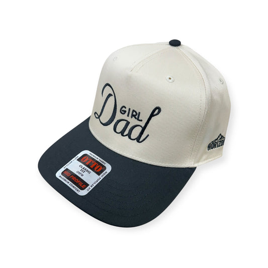 Angled view of Girl Dad embroidered cap by Horizon Hat Co. in natural/black showing the bill and side panels