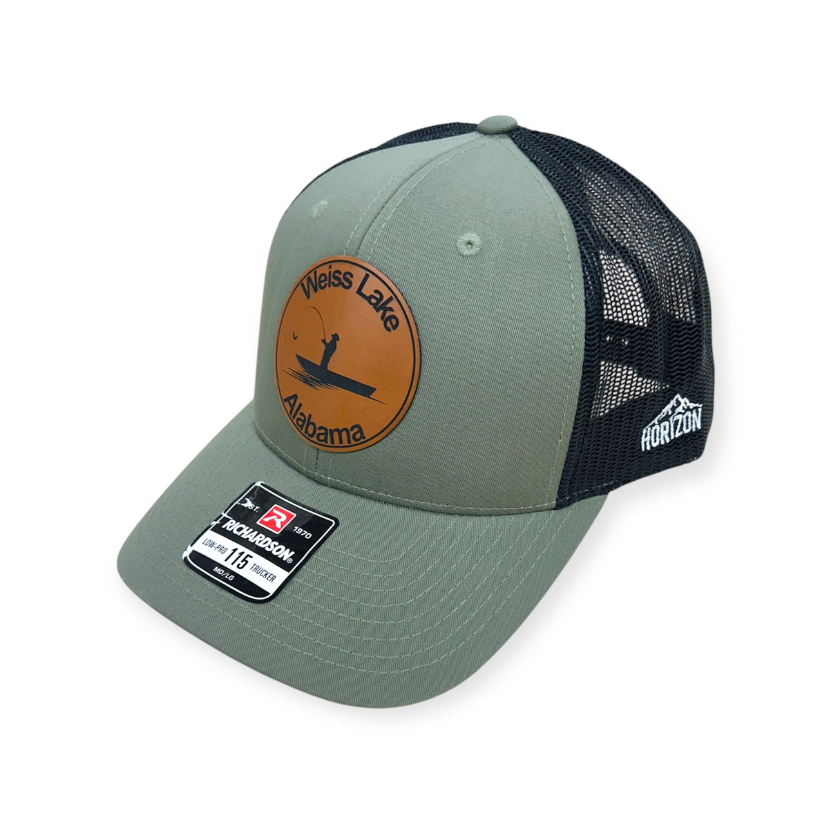 Angled view of Weiss Lake patch hat by Horizon Hat Co. in loden/black showing the curved bill and side panels