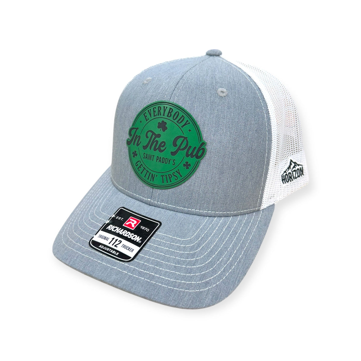 Angled view of Everybody In The Pub Gettin Tipsy patch hat by Horizon Hat Co. in heather gray/white showing the curved bill and side panels
