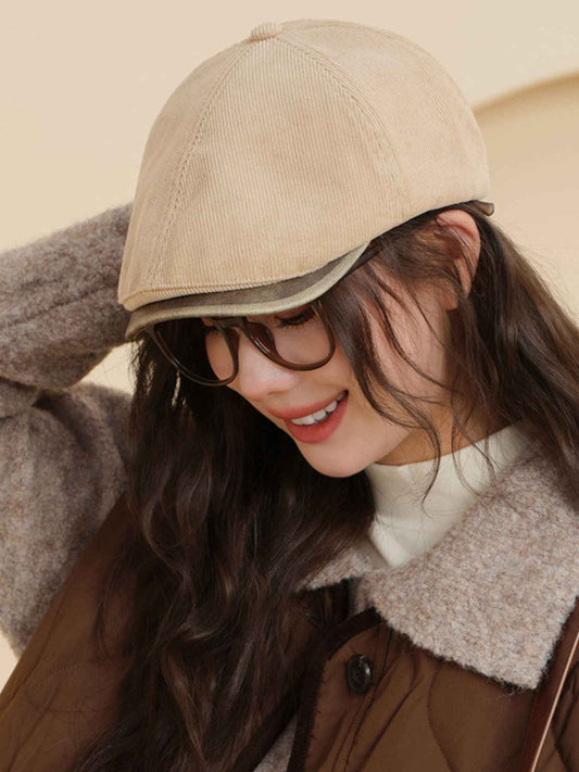 Vintage corduroy newsboy cap with a rounded, softly structured crown