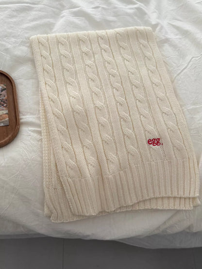 Unisex Cable Rib Winter Scarf — pale scarf laid flat to show the cable-like knit
