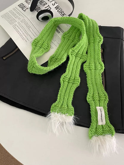 Unisex Plush-Tip Skinny Knit Scarf — green narrow scarf tied on a dark garment