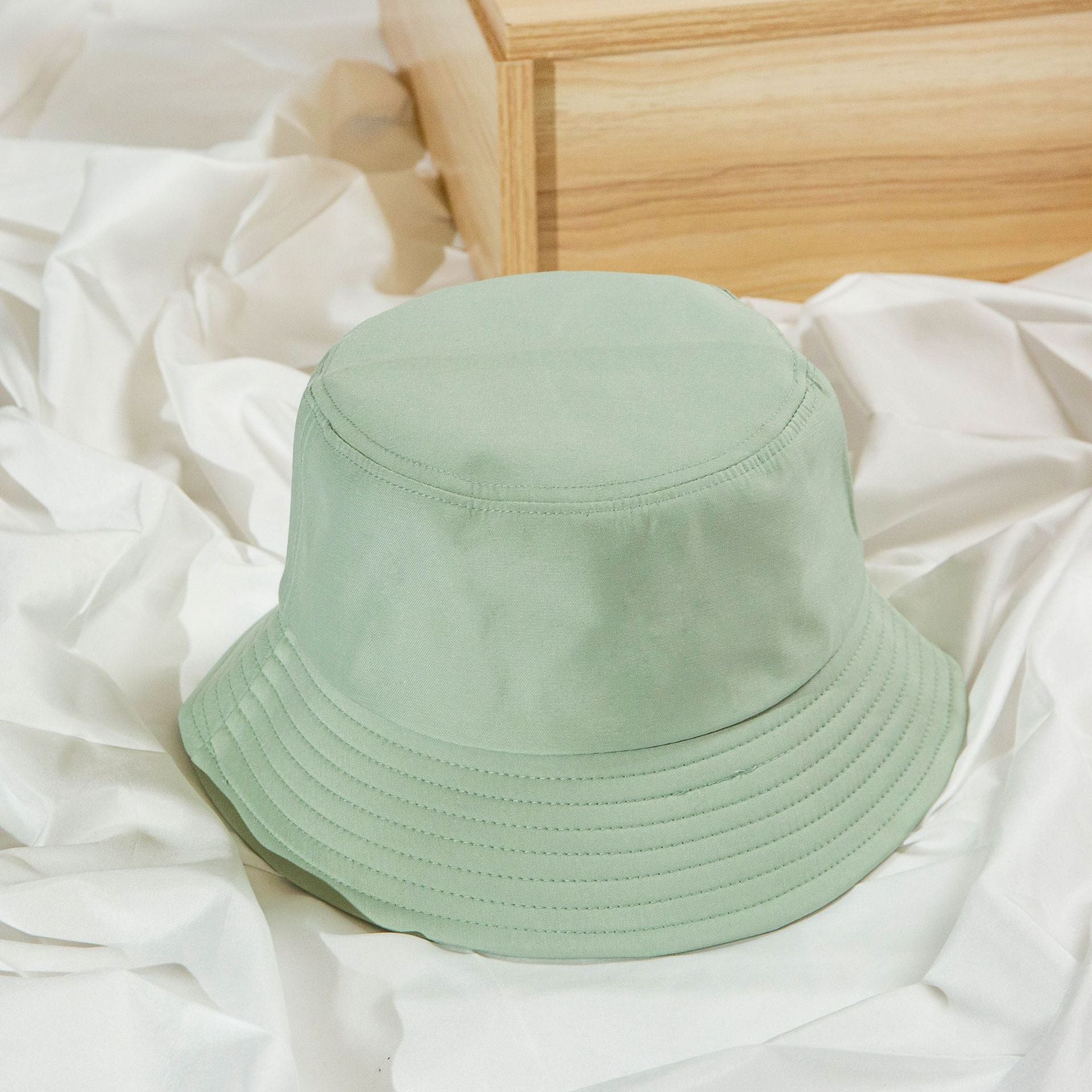Off-white cotton bucket hat crown detail