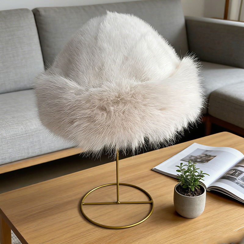 White plush cloche hat with a cream-toned fluffy edge