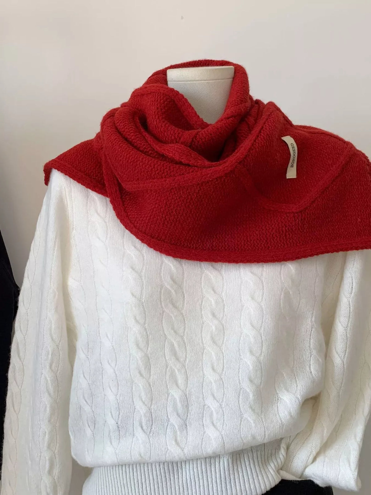 Unisex Solid Color Knitted Winter Scarf — red scarf wrapped broadly around the neckline