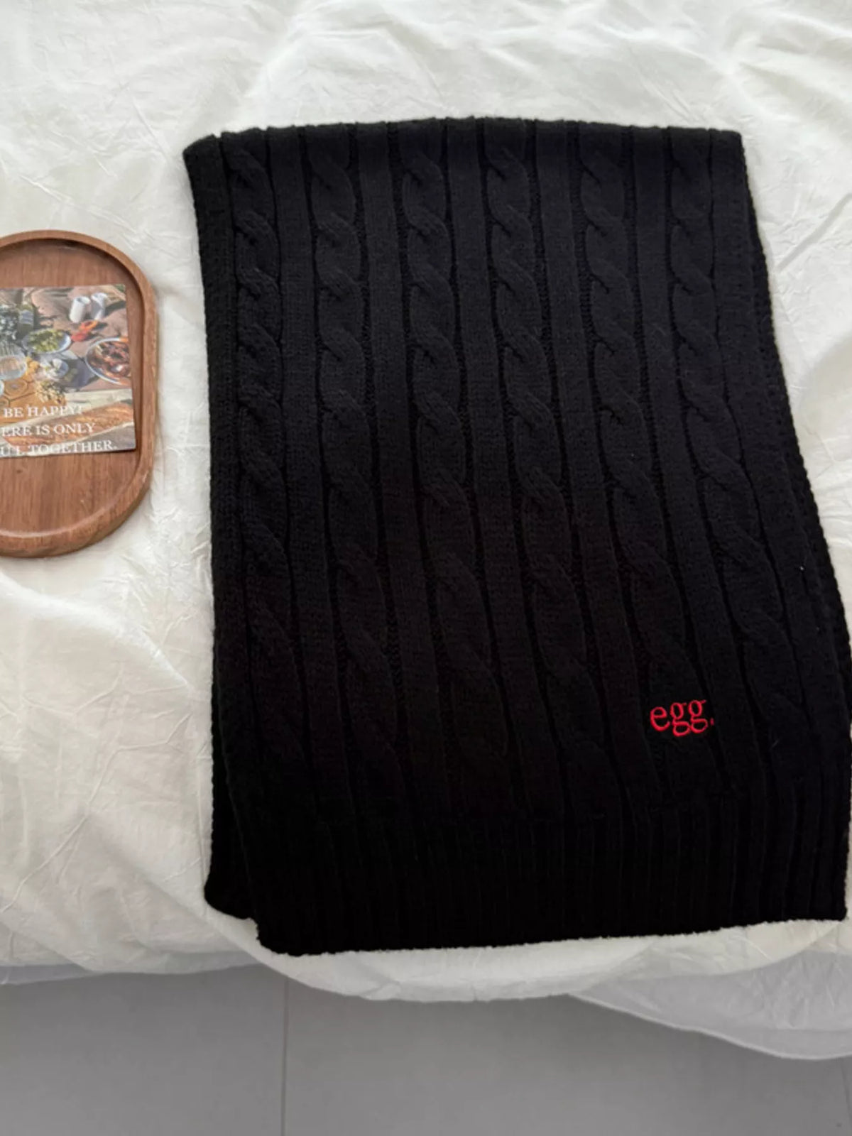 Unisex Cable Rib Winter Scarf — folded black scarf showing vertical textured columns