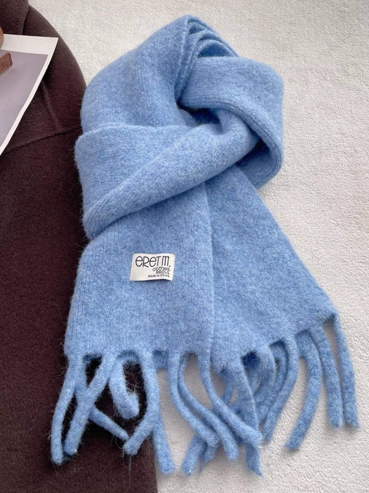 Unisex Fringe Solid Color Scarf — 70.9-Inch — sky blue solid scarf showing tasseled ends