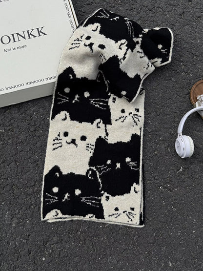 Unisex Allover Cat Knit Scarf — black scarf with pale cats loosely tied