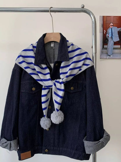 Unisex Striped Knitted Scarf with Pom-Poms — blue stripe scarf wrapped with pale pom-pom ends
