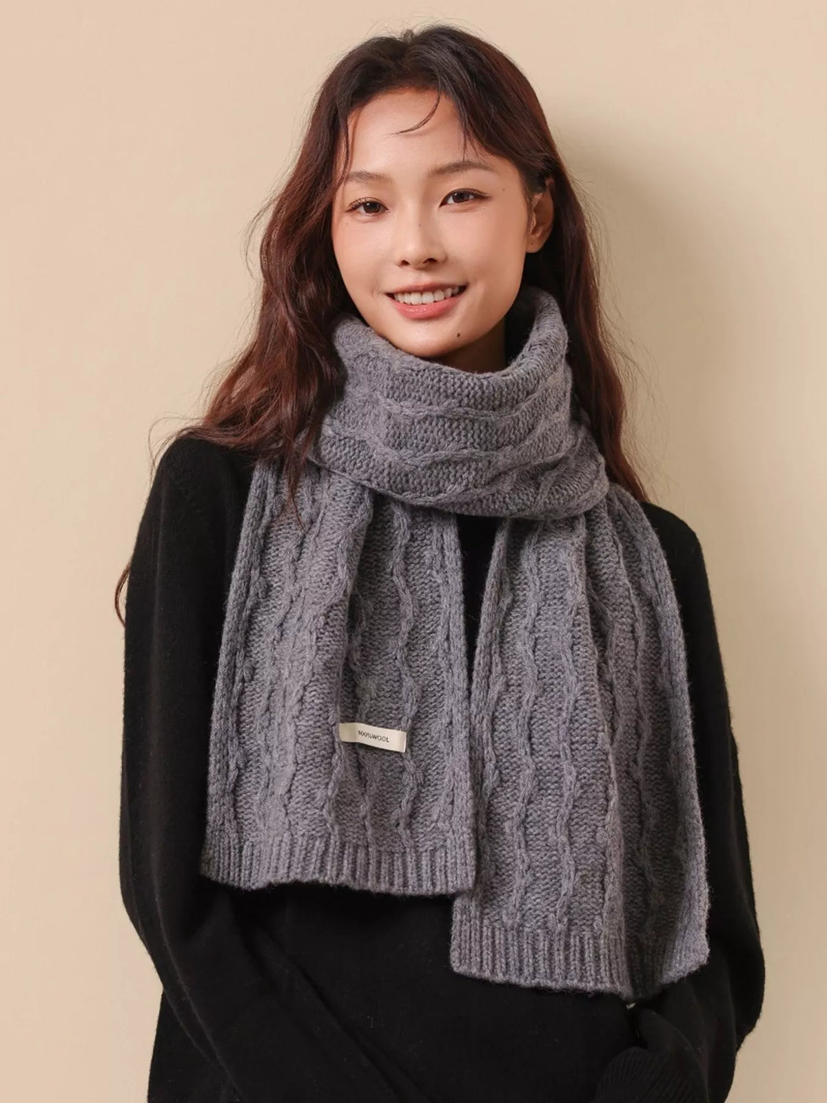 Unisex Wool Cozy Cable Knit Scarf — gray scarf styled with a black coat