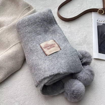 Unisex Pom-Pom Tassel Warm Scarf — folded gray scarf showing decorative round ends