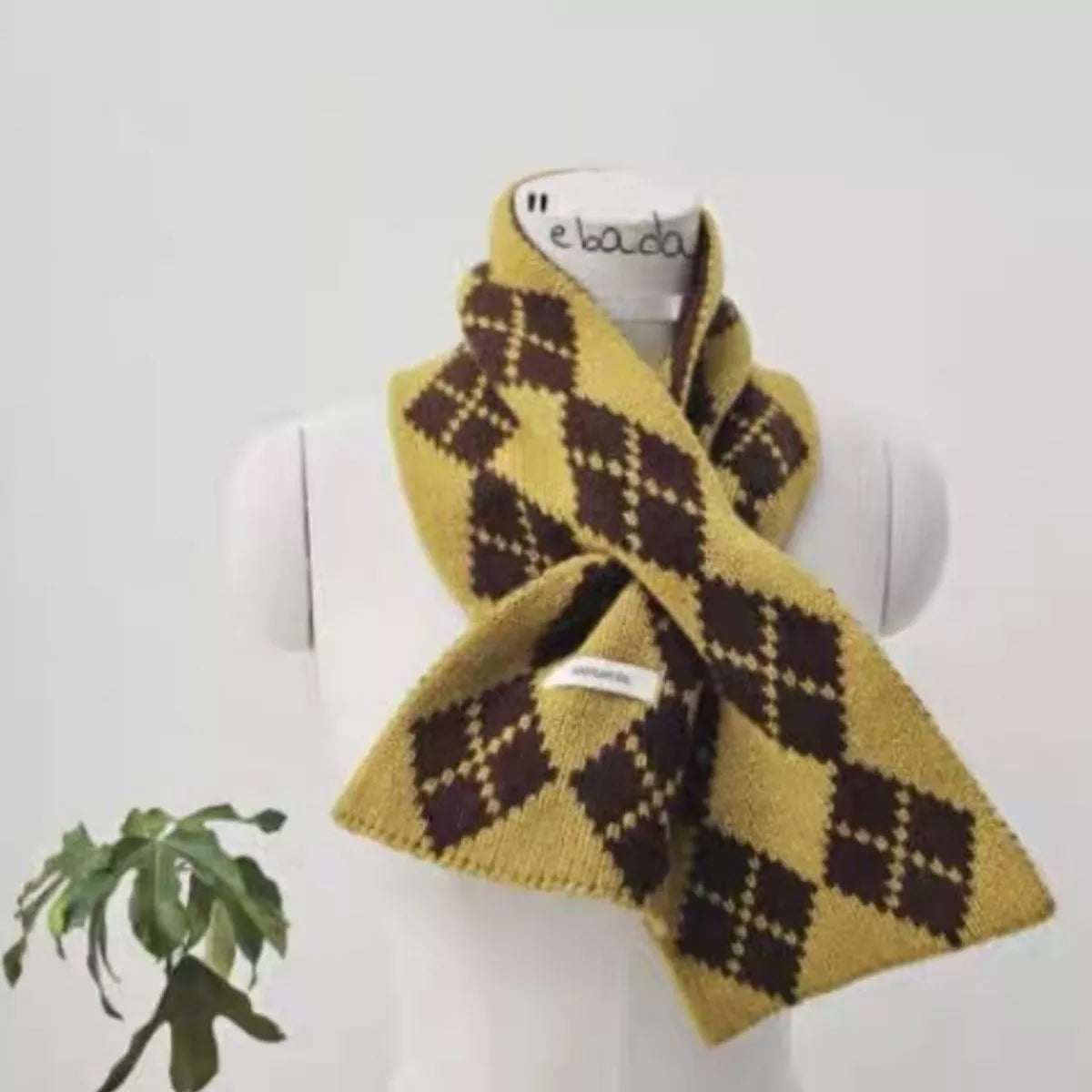 Unisex Yellow Argyle Wool Scarf — compact argyle scarf arranged in a loose front tie