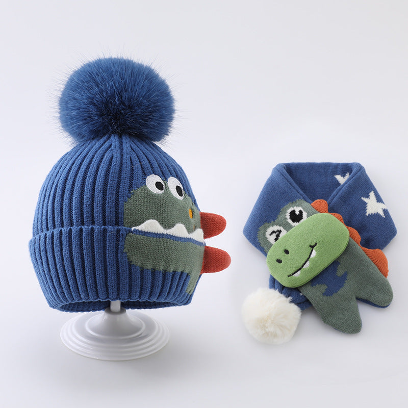 Blue dinosaur pom pom beanie with matching blue star scarf