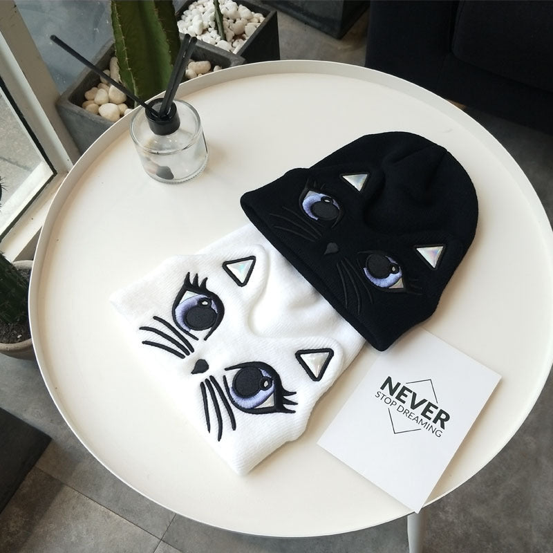 Women's Cute Embroidered Cat Knit Beanie — overlapping white and black embroidered cat hats