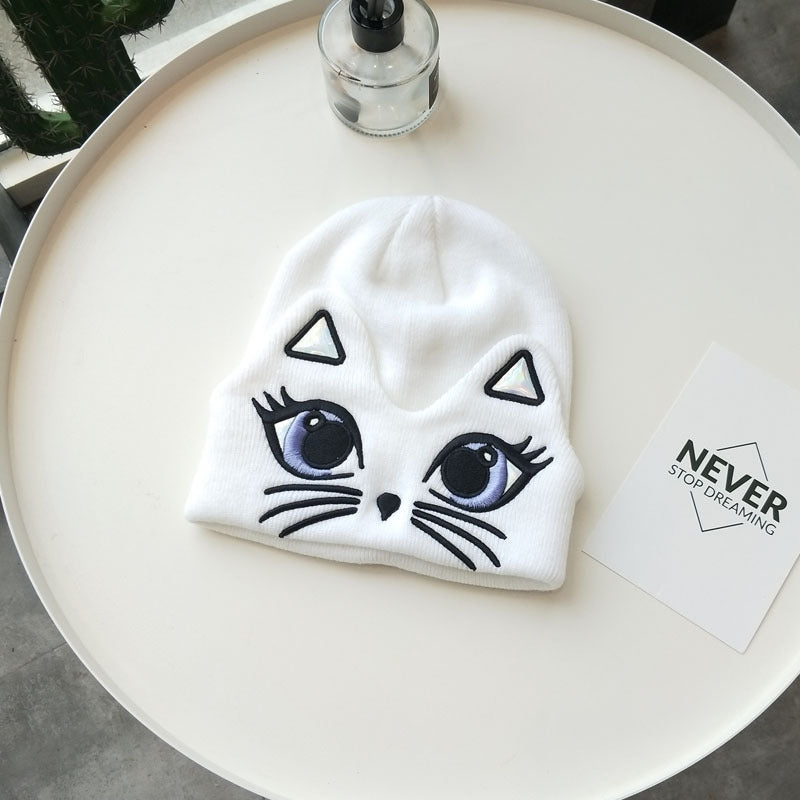 Women's Cute Embroidered Cat Knit Beanie — white cat beanie showing dark face embroidery
