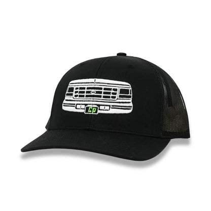 The Mad Hatter Company The OBS - Complete Performance, black mesh cap with an embroidered truck grille graphic