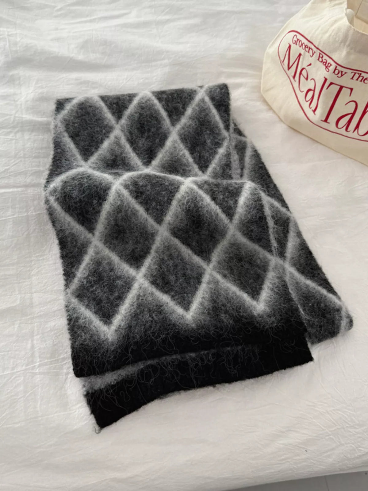 Unisex Diamond Grid Fuzzy Scarf — black scarf with pale diagonal diamond lines