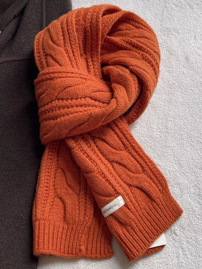 Unisex Wool Cable Knit Winter Scarf — orange cable scarf arranged in a loose knot