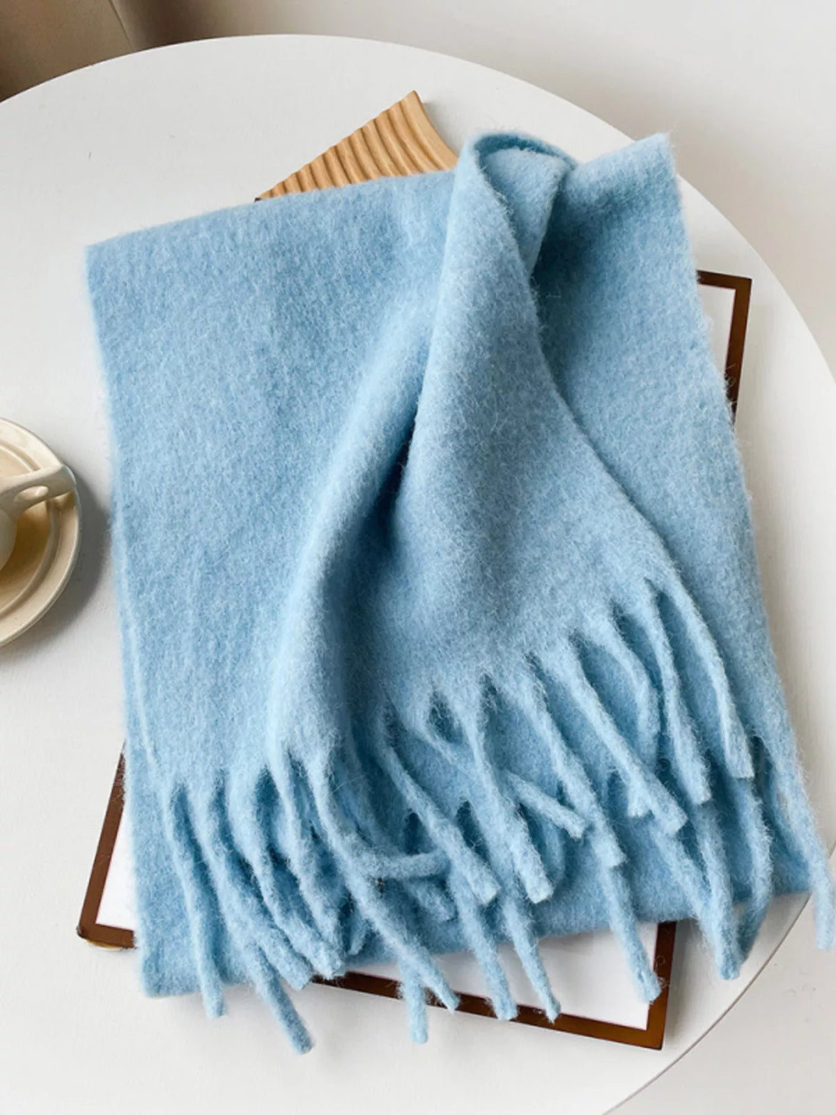 Unisex Extra Long Fringe Scarf — pastel blue scarf folded with long matching fringe