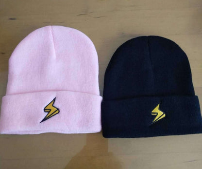Pink and dark beanies with contrasting yellow lightning embroidery