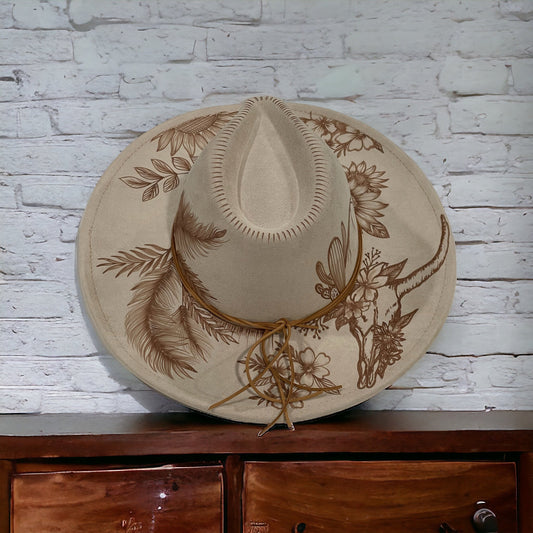 Beige Piper Boho Luxe hat with lotus-inspired flowers and leafy burned artwork