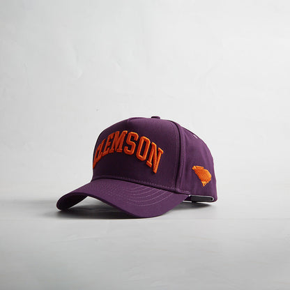 Destination Hat Co. Clemson Legacy snapback with purple crown and purple bill, angled view
