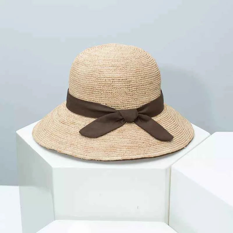 Gray straw sun hat with ribbon side profile