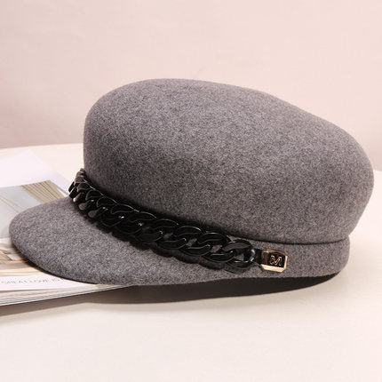 Baker boy cap wool texture and chain hardware