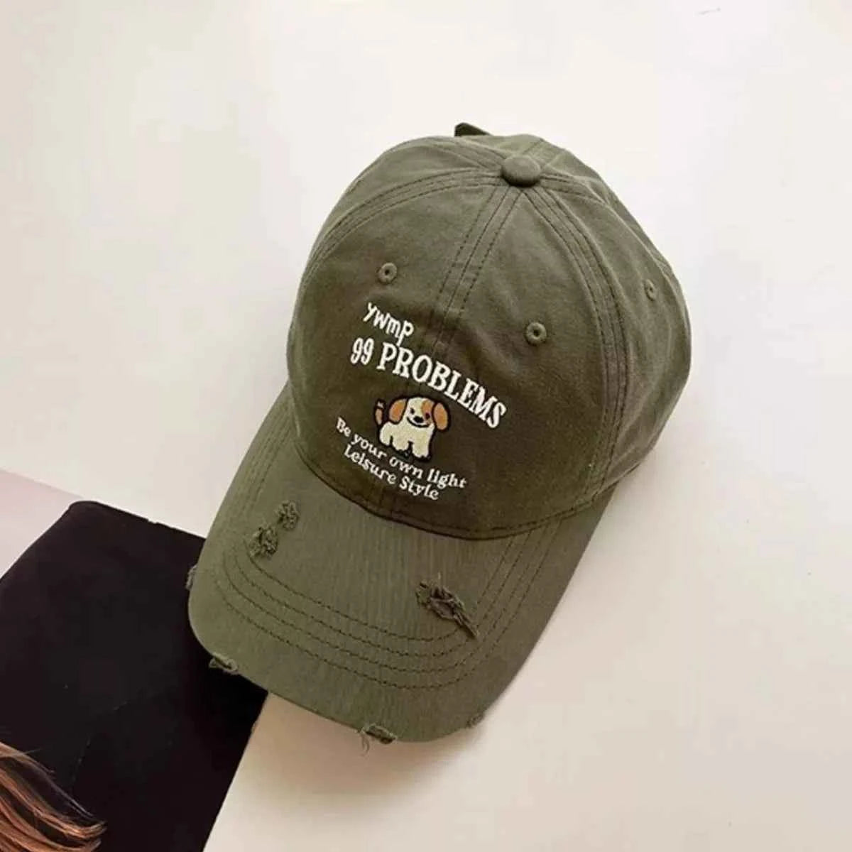 Beige dog distressed baseball cap embroidered front