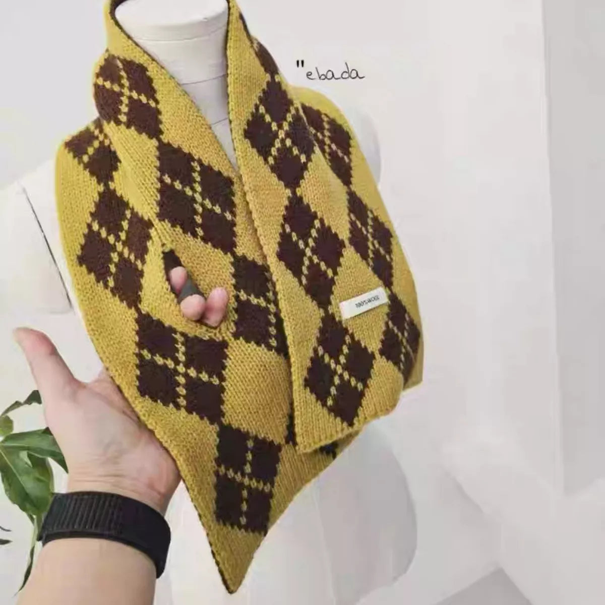 Unisex Yellow Argyle Wool Scarf — yellow argyle scarf draped over a pale top