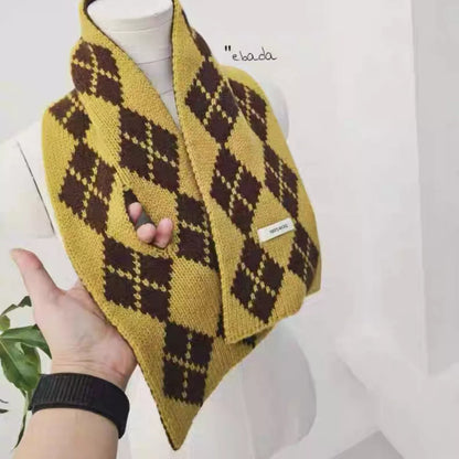 Unisex Yellow Argyle Wool Scarf — yellow argyle scarf draped over a pale top