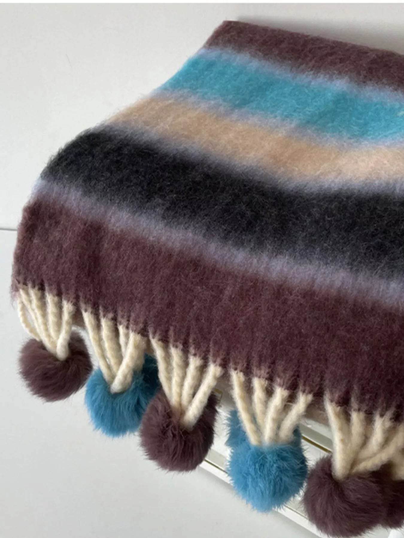 Women's Rainbow Striped Fuzzy Scarf with Pom-Poms in Style D - draped view 4