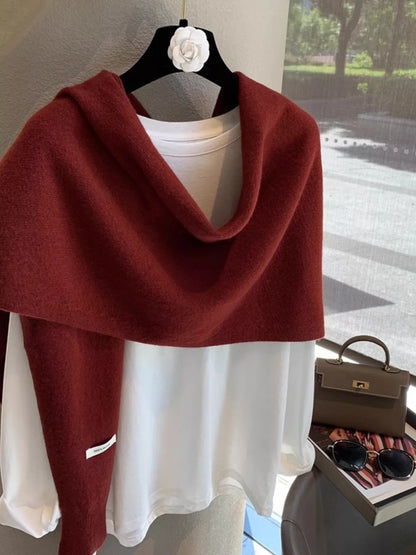 Women's Wool Knitted Asymmetrical Shawl — burgundy red shoulder shawl over a white blouse