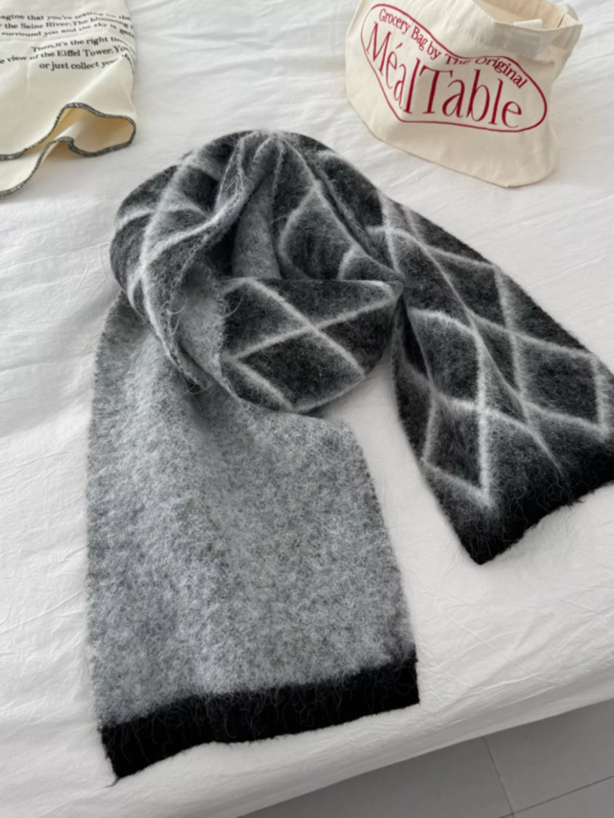 Unisex Diamond Grid Fuzzy Scarf — black diamond grid scarf arranged in a loose knot