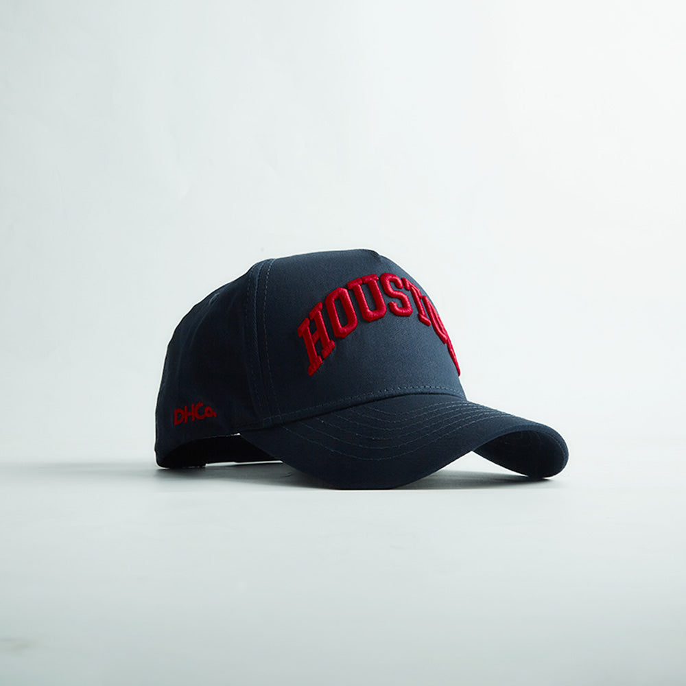 Opposite angled view of the Destination Hat Co. Houston Legacy snapback showing the red lettering