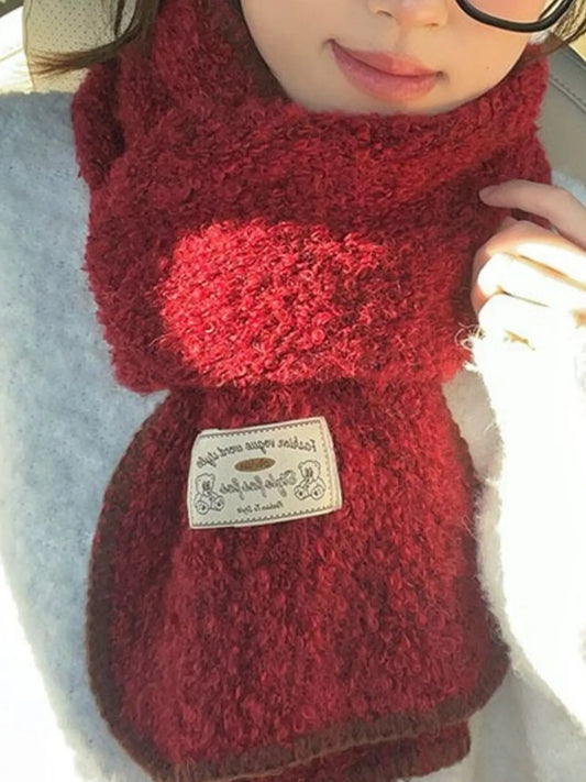 Unisex Contrast Edge Plush Scarf — close view of a red scarf at the neckline