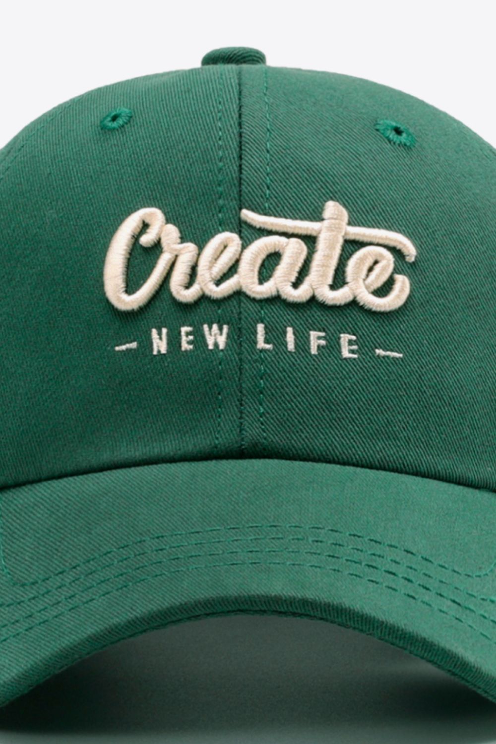Ivory slogan cap neutral outfit styling view