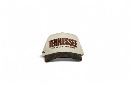 Front view of the Destination Hat Co. Tennessee camo cap with brown embroidery
