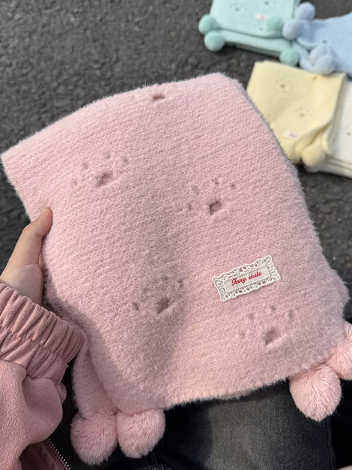 Unisex Cat Paw Pom-Pom Scarf — tender pink paw patterned scarf held flat