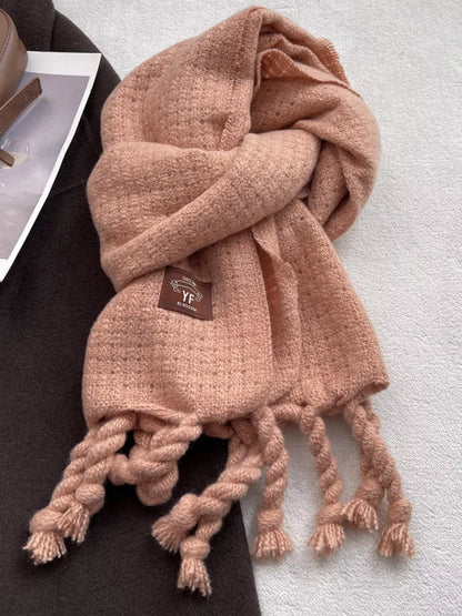 Unisex Knitted Tassel Scarf — pink scarf showing thick twisted tassel ends