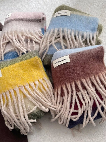 Unisex Soft Plaid Tassel Warm Scarf — stack of multicolor plaid scarves with pale tassels