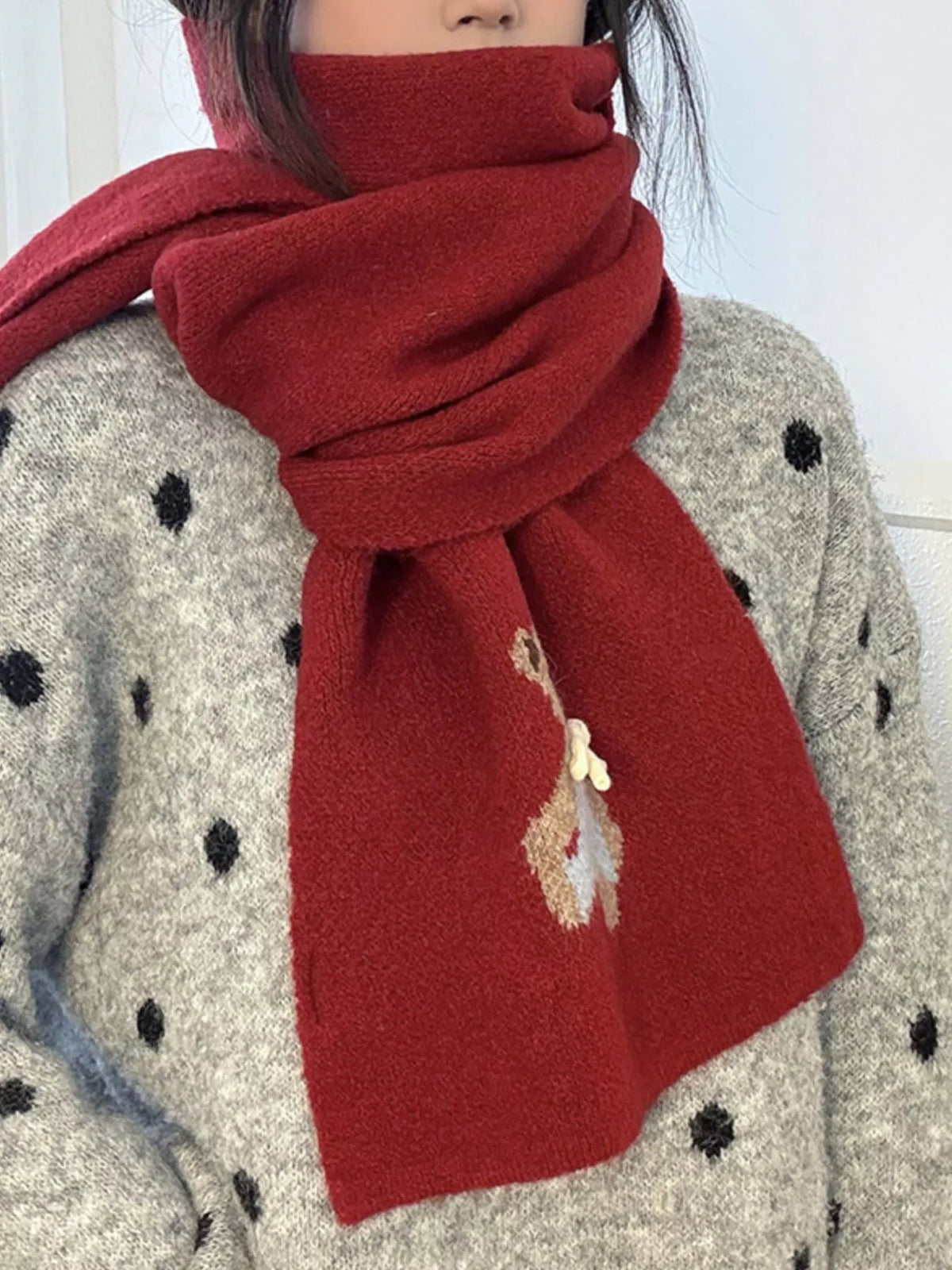 Unisex Bear Motif Knit Scarf — red bear motif scarf worn with a patterned cardigan